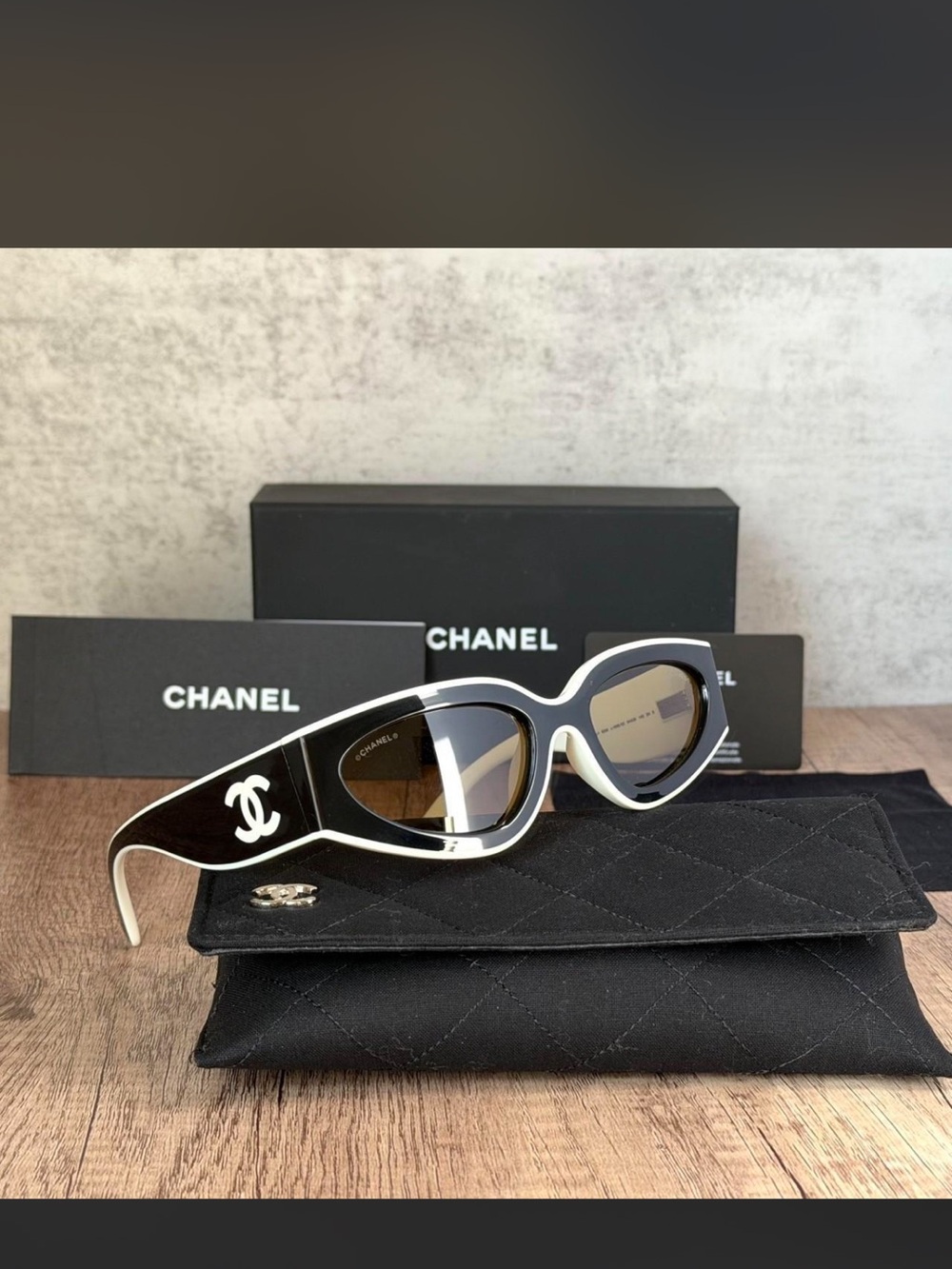 CHANEL Black & White Oval Cat-Eye Sunglasses with CC Emblem